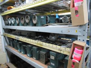 (LOT) RACK WITH CONTENTS GEAR BOXES AND DRIVES